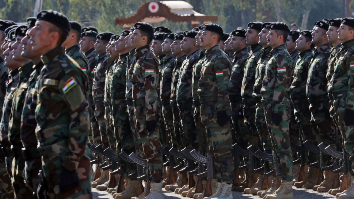 Iraqi Kurdish Peshmerga members at a graduation