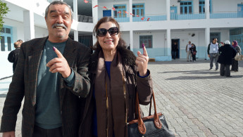 Tunisians vote (AFP)