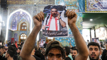 Mourner at funeral of assassinated Ihab al-Wazni. [Getty]