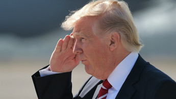 Donald Trump salutes -- AFP