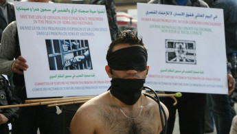 torture protest AFP