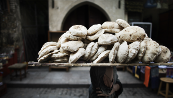 egypt boy bread seller AFP