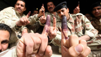 Iraq troops ink stain finger 2010 election AFP