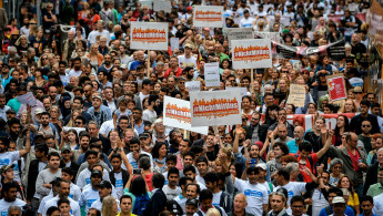 Muslims march in anti-terror protest in Germany [Getty]