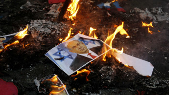 Netanyahu portrait fire Tehran afp