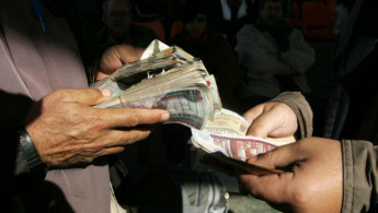 Egyptian Pound devaluation [Getty]