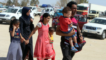 Iraq Fallujah families [AFP]
