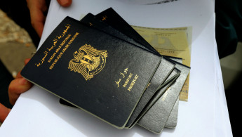 Syrian passport [AFP]