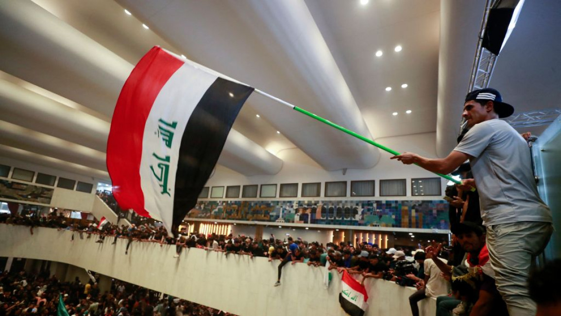 Muqtada Al-Sadr followers protesting inside Iraq's parliament.