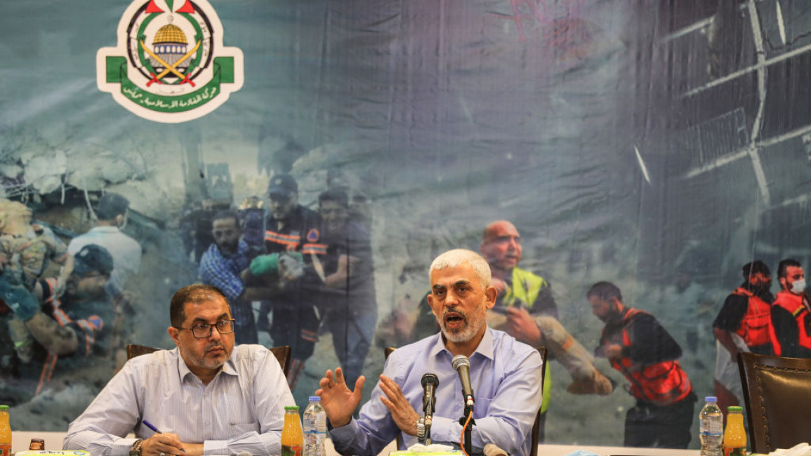 Hamas leader Yahya Sinwar (right) promised "transparent and impartial" distribution of aid [Getty]