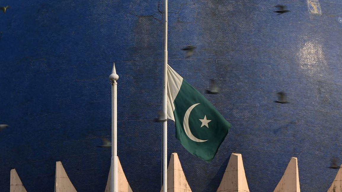 Pakistani flag flying at half-mast