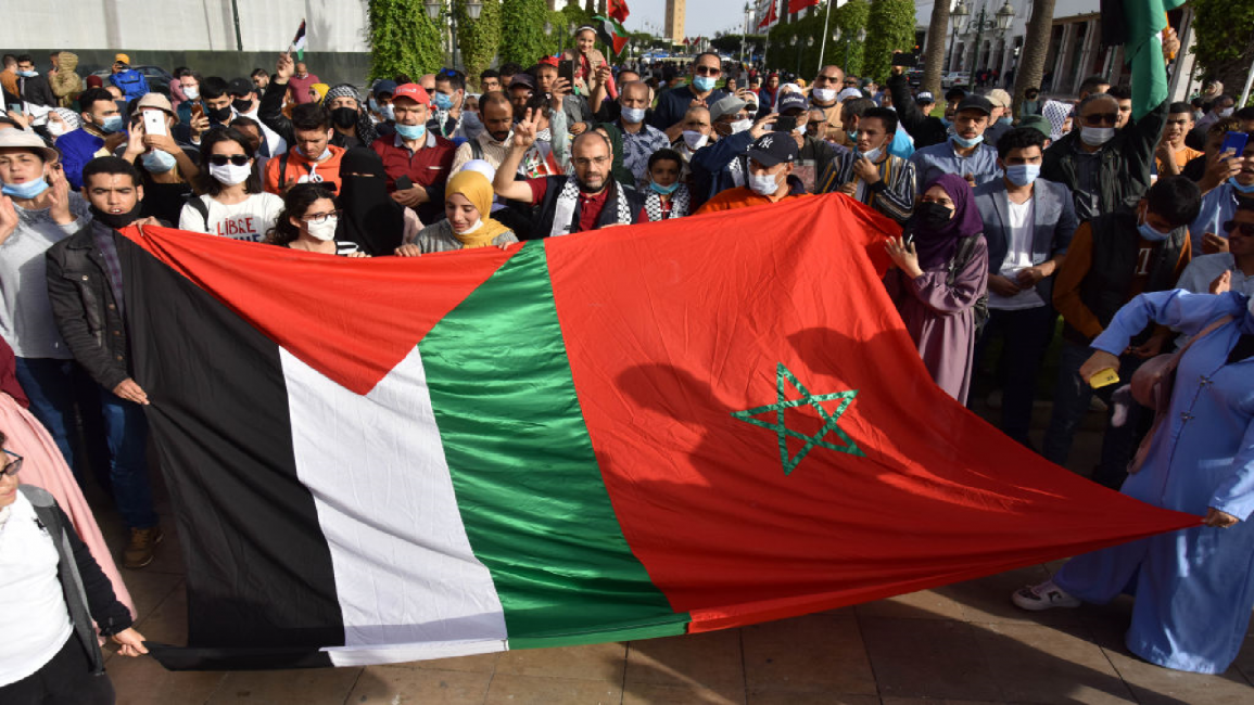 Palestine and Moroccan flags during a solidarity march with the Palestinians.