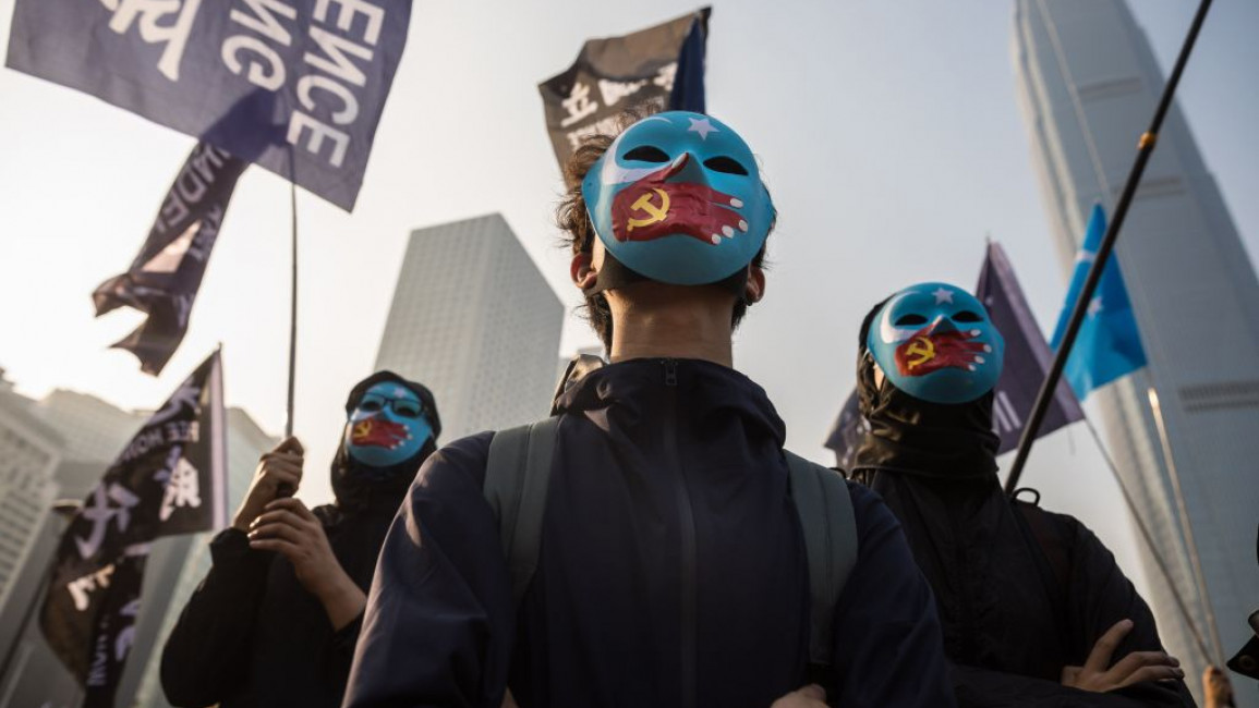 Protesters attend a rally in Hong Kong to show support for the Uighur minority in China on 22 December, 2019. [Getty]