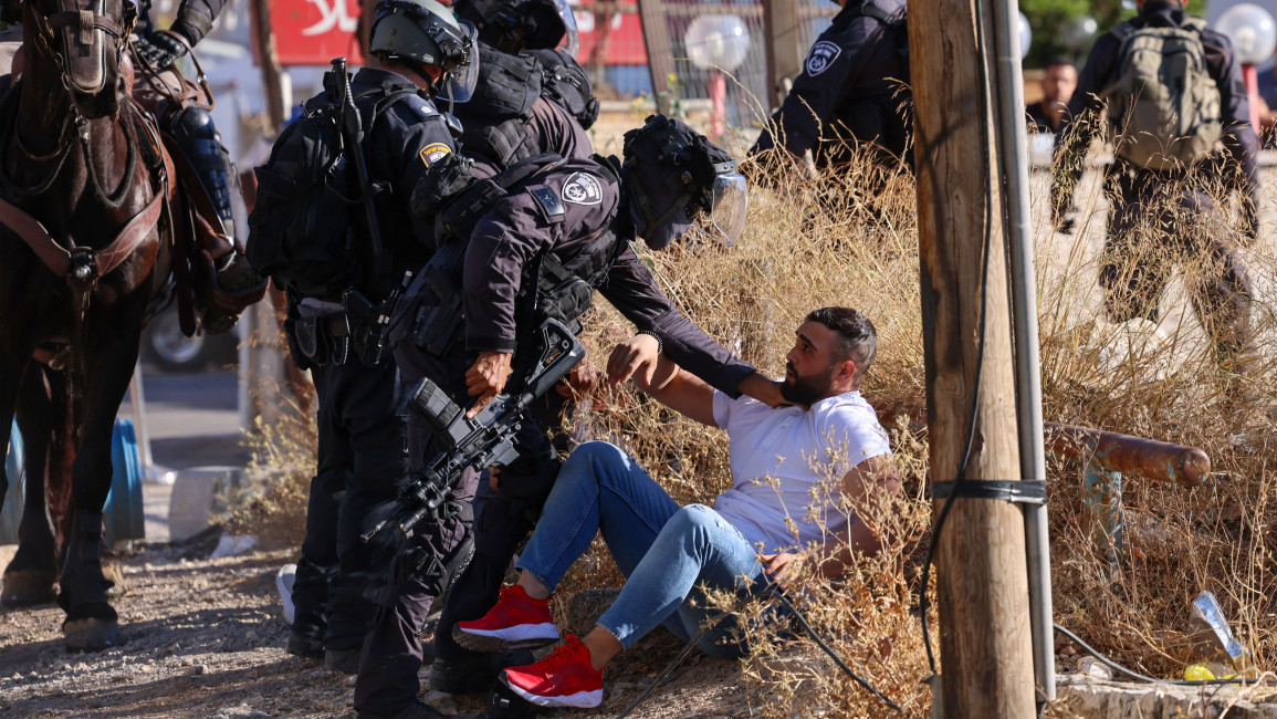 Israeli police arrest Palestinian man in East Jerusalem, May 18, 2021 [Getty]