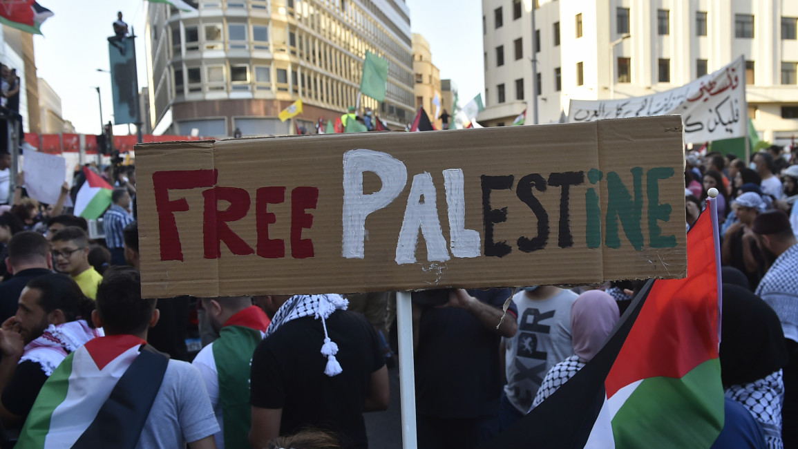 Lebanese protesters take part in a demonstration in support of Palestinians on 18 May 2021 in Beirut, Lebanon. [Getty]