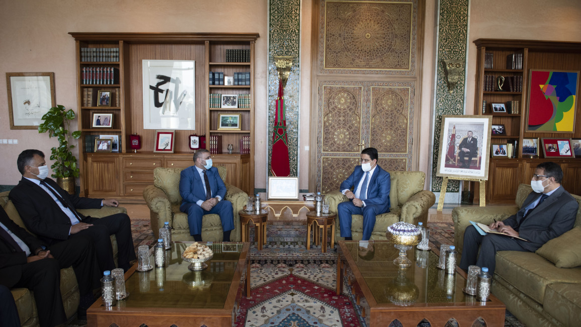Moroccan Foreign Minister Nasir Burita (2nd R) meets Chairman of the High Council of State of Libya Khalid al-Mishri