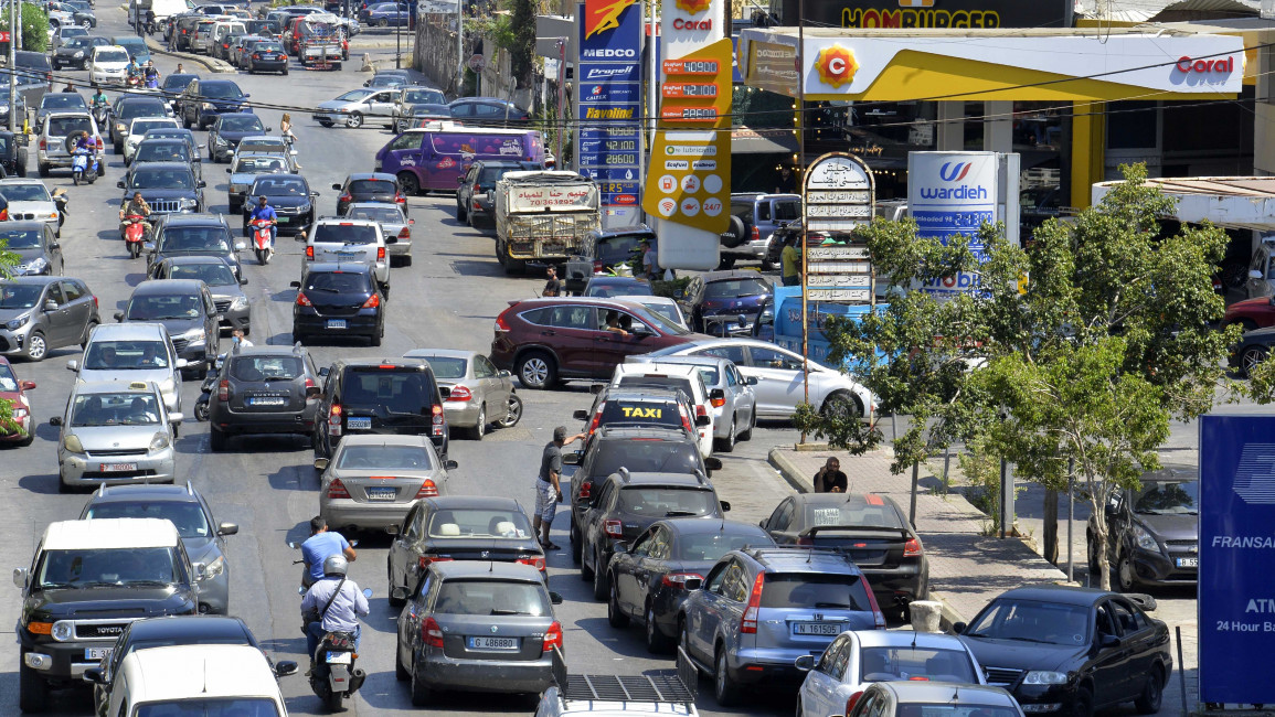 BEIRUT, LEBANON - JUNE 08: Drivers wait in long queues to obtain 10 liters of fuel for their vehicles at petrol stations as economic crisis worsens in Beirut, Lebanon on June 08, 2021. (Photo by Houssam Shbaro/Anadolu Agency via Getty Images)