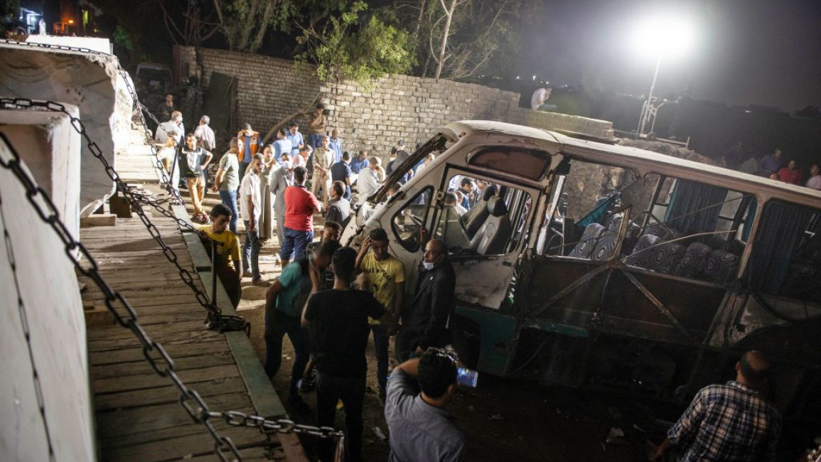 Two people were killed when a train collided with a minibus in the Cairo suburb of Helwan [AFP]