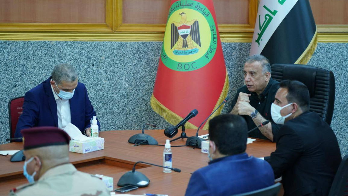 Iraqi PM Mustafa Al-Kadhimi (seated at the head of the table) has devised a cross-interest lobbying campaign to help secure victory in the upcoming elections [Getty Images]