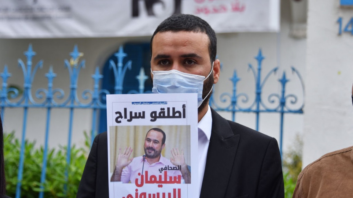 Supporters of Soulaimane Raissouni (in poster) say the charges against him are politically motivated [Getty]
