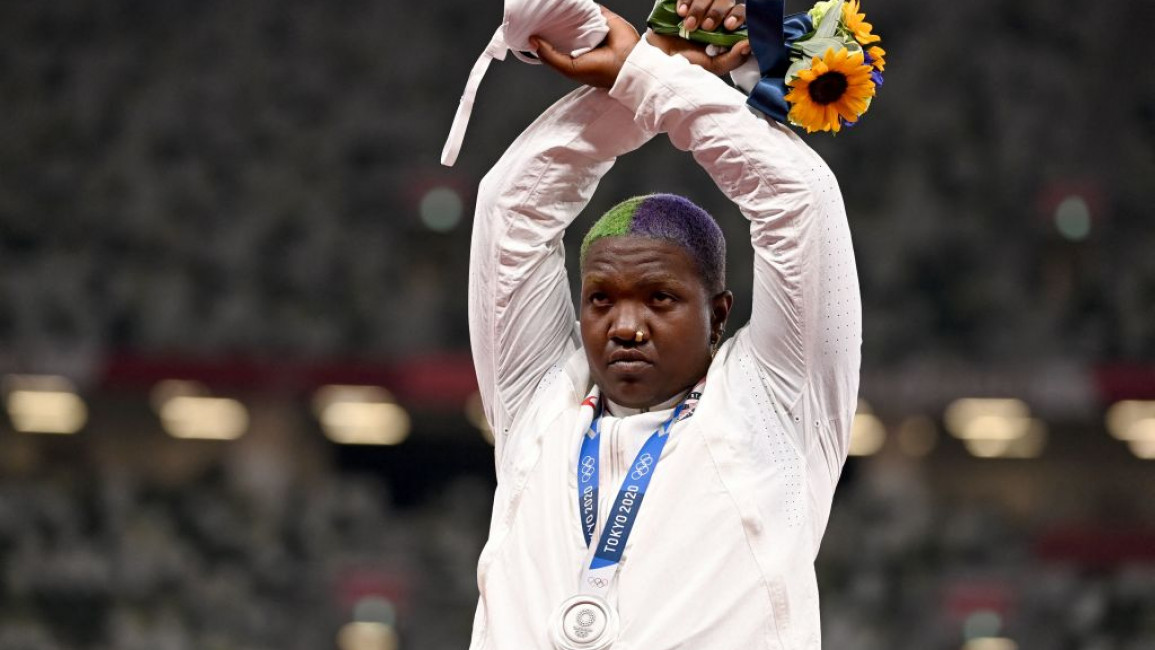 TOKYO, JAPAN - AUGUST 01: Raven Saunders of Team United States makes an 'X' gesture during the medal ceremony for the Women's Shot Put on day nine of the Tokyo 2020 Olympic Games at Olympic Stadium on August 01, 2021 in Tokyo, Japan. (Photo by Ryan Pierse/Getty Images)