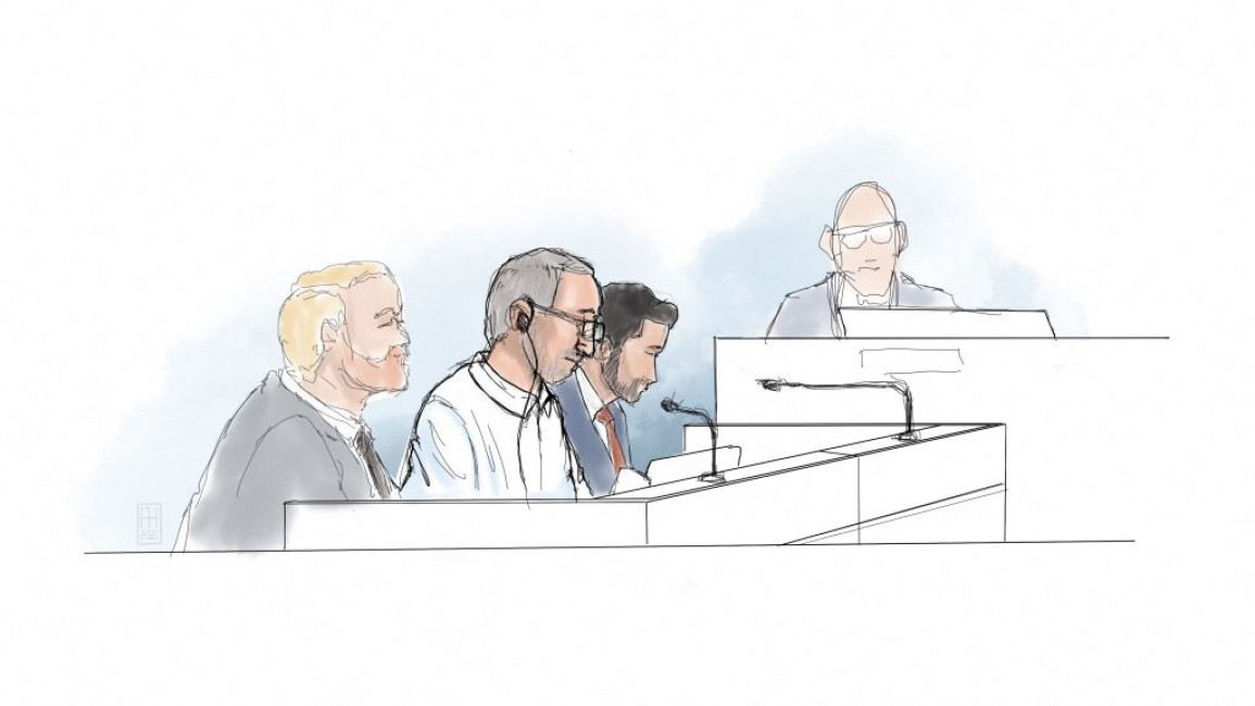 This courtroom sketch shows Iranian defendant Hamid Noury