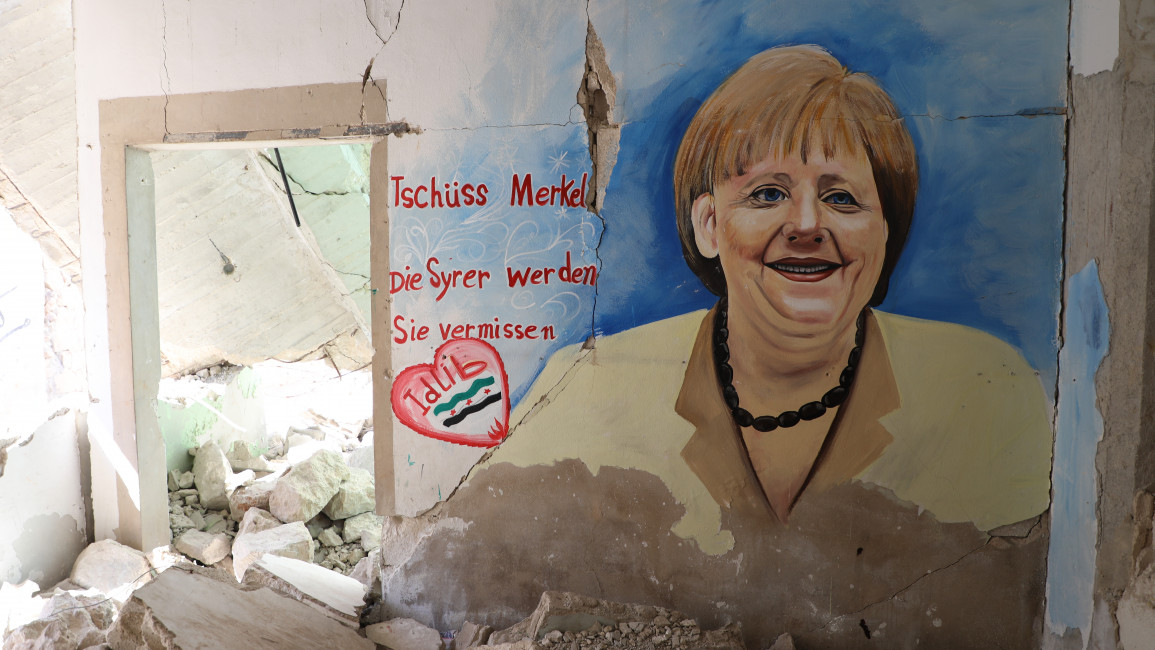 A mural of German Chancellor Angela Merkel in Idlib reading "Goodbye Merkel, the Syrians will miss you"