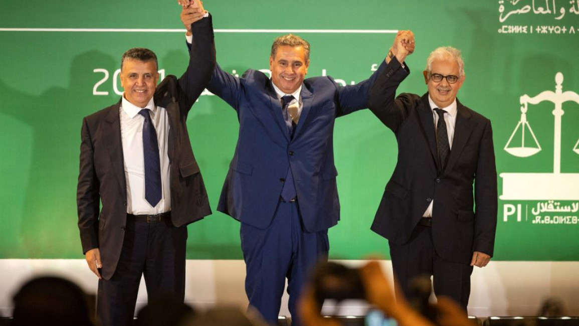 Morocco's prime minister-designate Aziz Akhannouch (C), Abdellatif Ouahbi (L), president of Morocco's Authenticity and Modernity Party (PAM) and Nizar Baraka (R), president of the Istiqlal Party, gather after Akhannouch announced a coalition of RNI, PAM and Istiqlal, on September 22 , 2021 in Rabat [Getty Images]