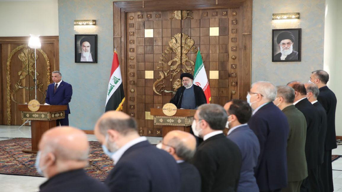 Iraqi PM (L) and Iranian president