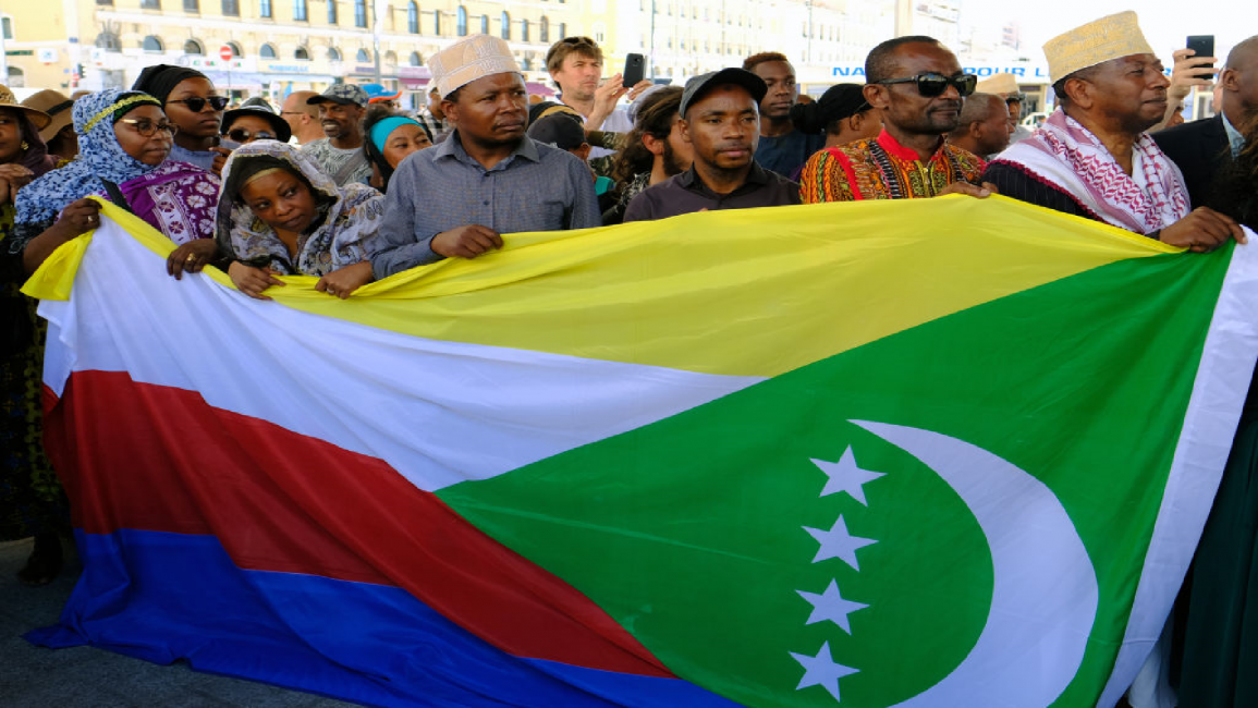 People hold Comoros flag
