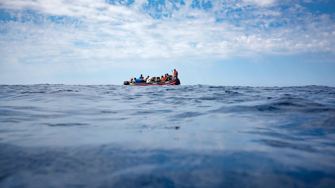 A boat carrying migrants is stranded in the Strait of Gibraltar before being rescued by the Spanish Guardia Civil and the Salvamento Maritimo sea search and rescue agency on September 8, 2018