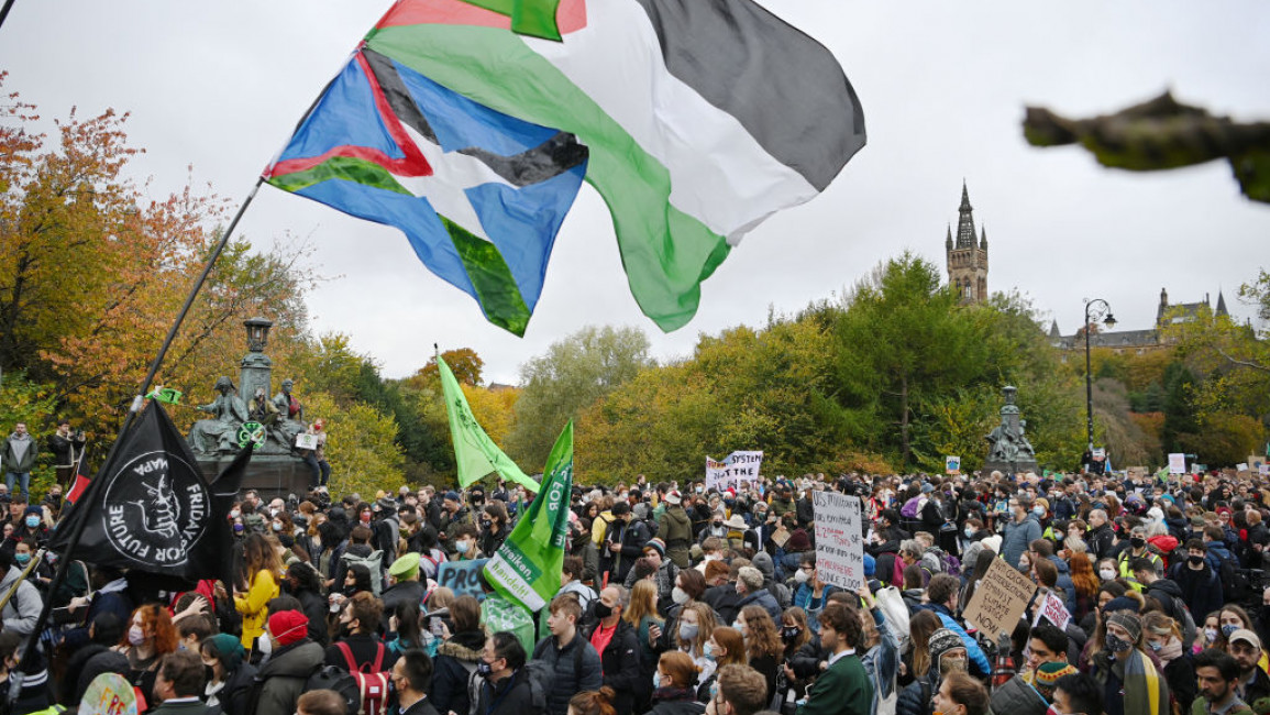 Demonstrators join the Fridays For Future march on November 5, 2021 in Glasgow, Scotland. Day Six of the 2021 climate summit in Glasgow will focus on youth and public empowerment. Outside the COP26 site