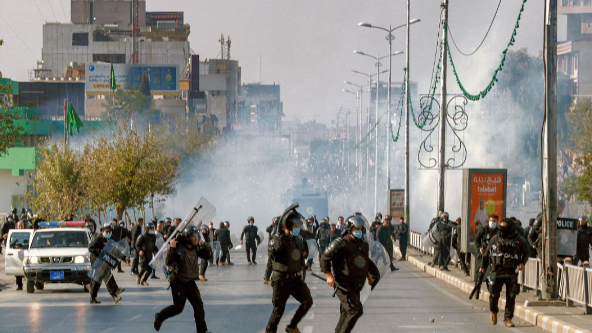 Police, after firing several volleys of tear gas followed by shots in the air, chased demonstrators as they dispersed