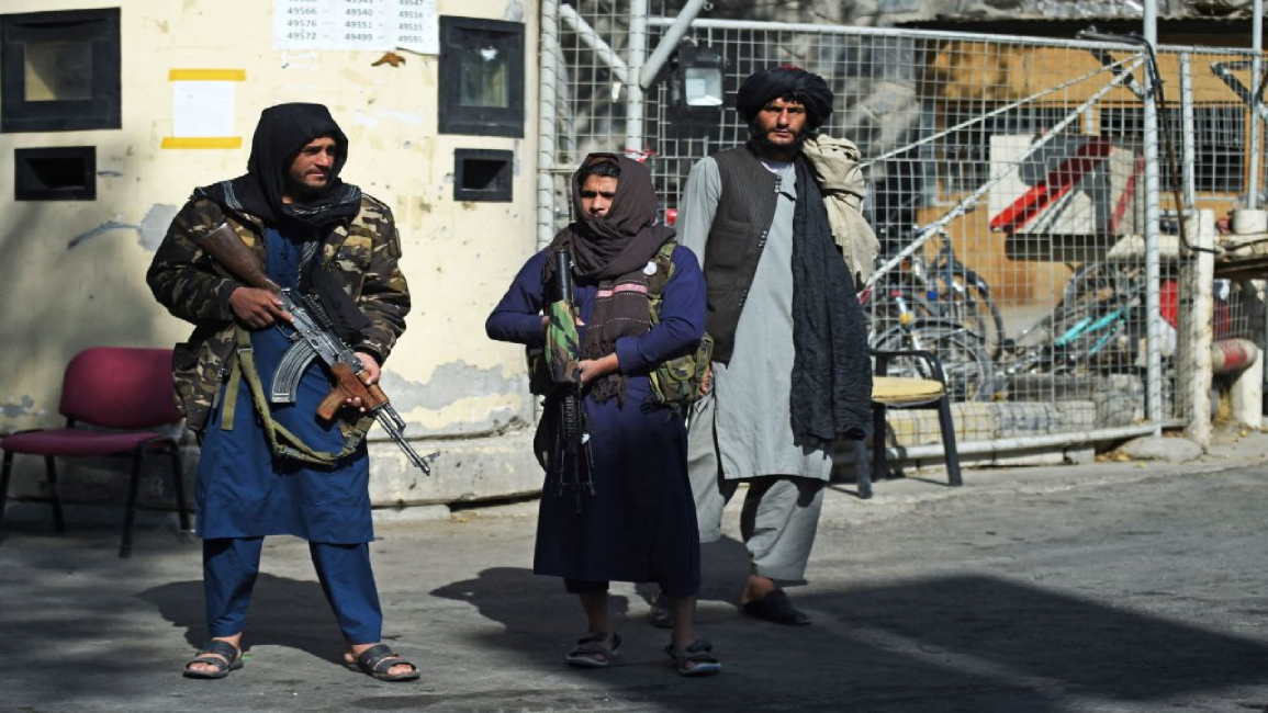 Taliban militants outside Kabul military hospital