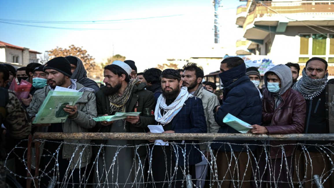 Afghans queue for passports