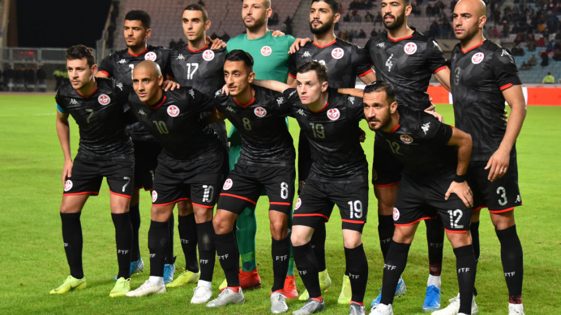 Tunisian players pose for a photo before the 2021 Africa Cup of Nations group J qualifying football match between Tunisia and Libya [Getty Images]