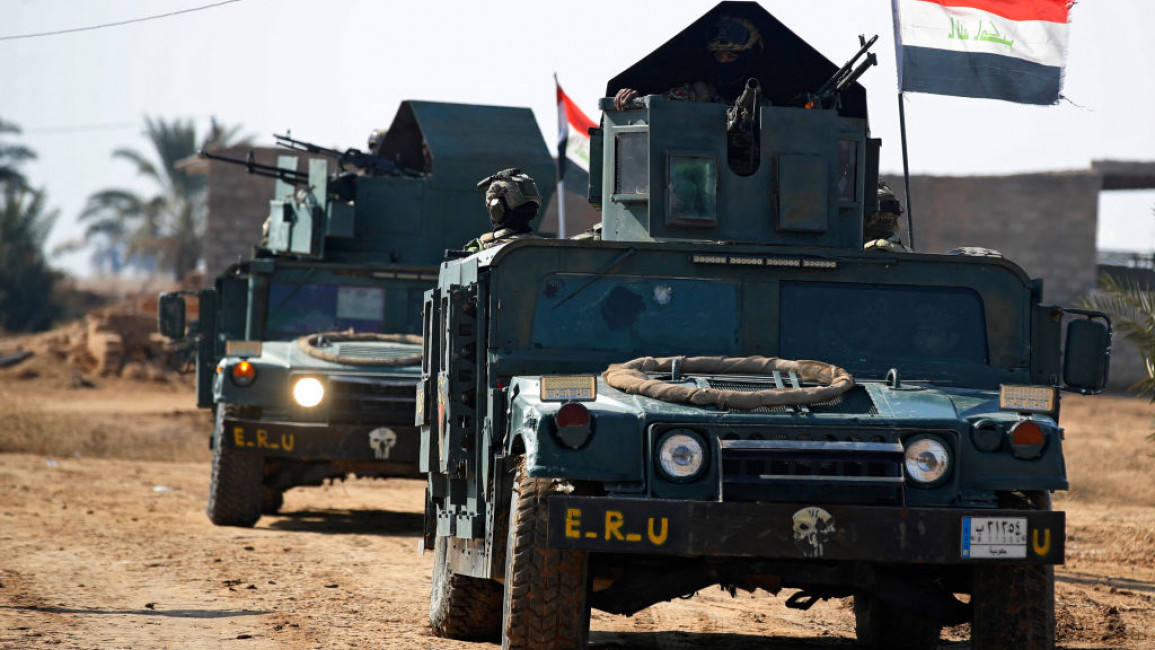 Two Iraqi army trucks