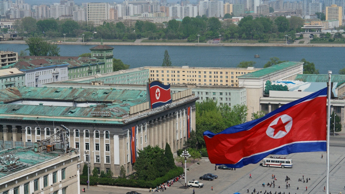 A North Korean flag is seen blowing in the air in Pyongyang