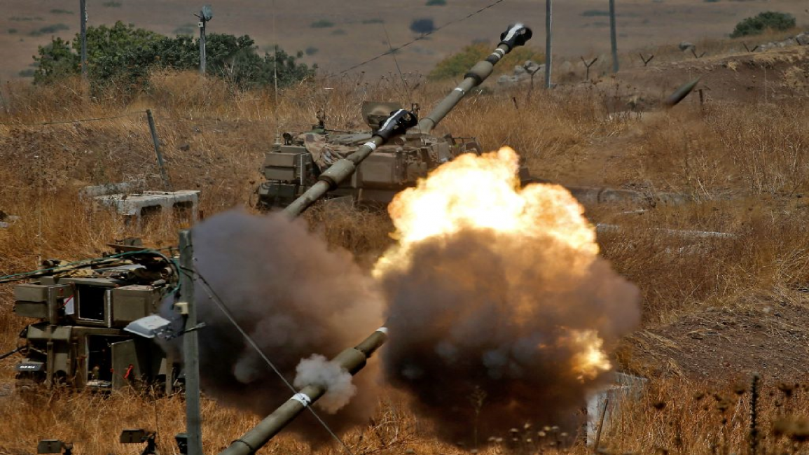 Israeli tanks fire