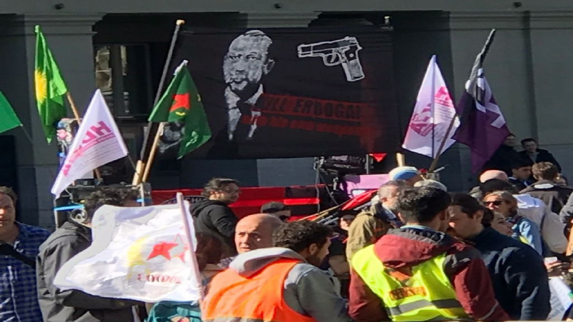 Supporters of the PKK hold placards reading "Kill Erdogan" in Swiss capital