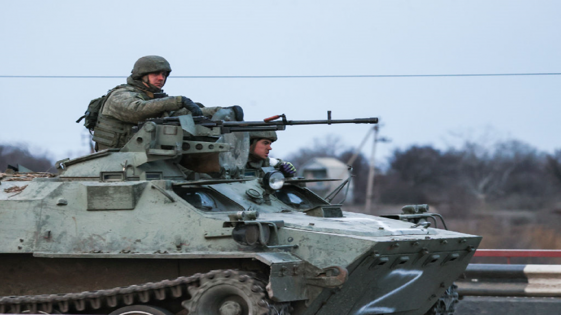A Russian military column moves across the town of Armyansk, northern Crimea