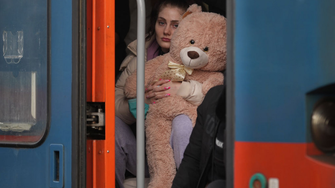  Refugees arrive at the Hungarian border town of Zahony on a train