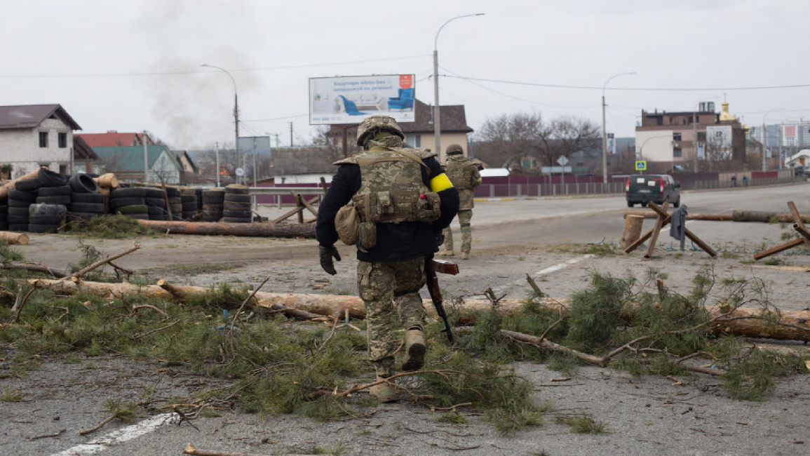 Ukrainian servicemen in a military checkpoint in Irpin, Ukraine
