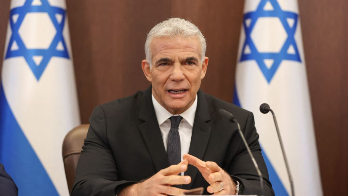 Lapid has held direct talks with Assad, according to an Israeli media report [Getty]