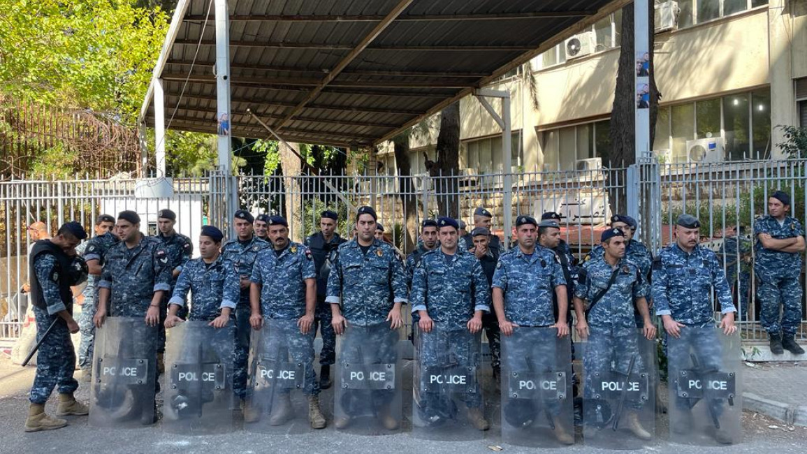 Lebanese security forces stand outside the Palace of Justice as two activists attend their court hearing inside. [TNA - William Christou]