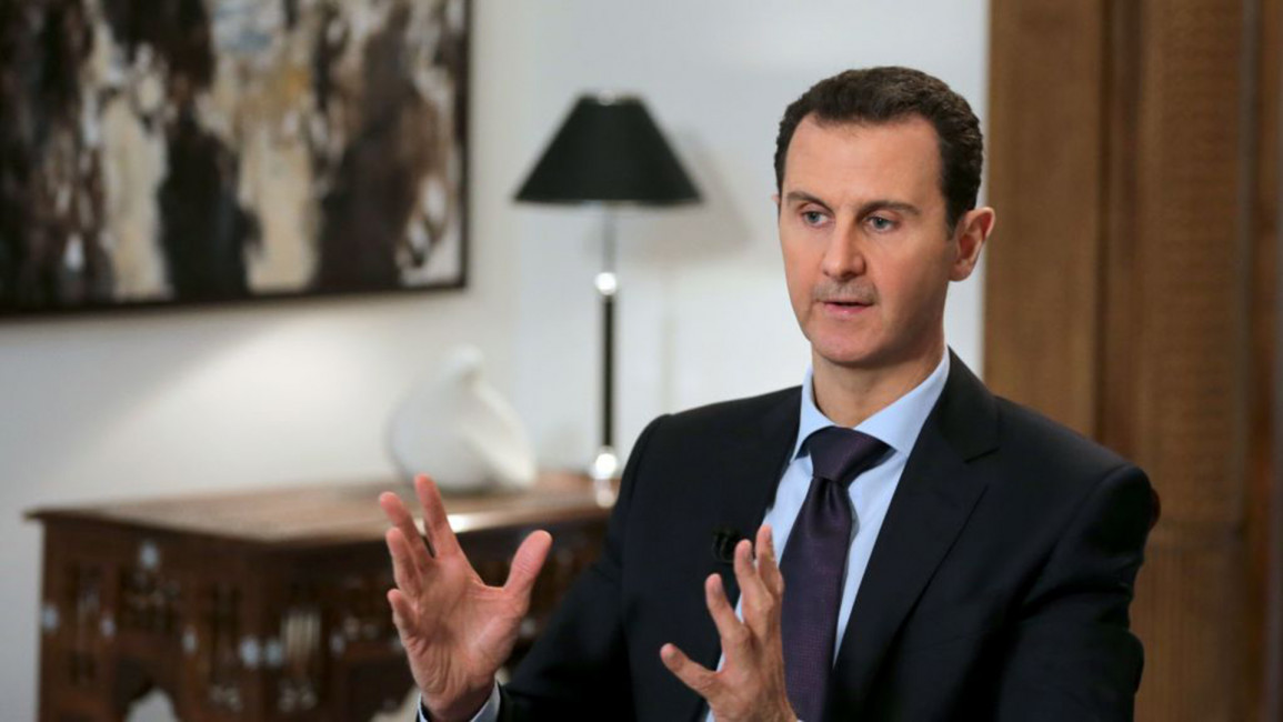 Assad speaking [Getty]