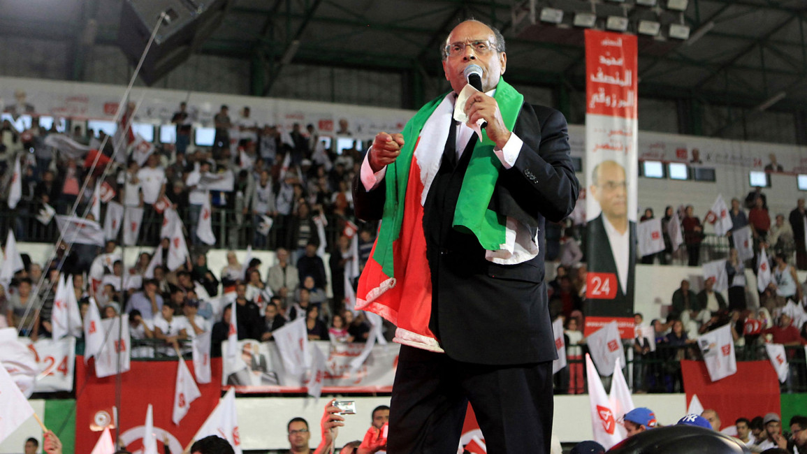 The incumbent, Moncef Marzouki, addresses supporters on Friday (Anadolu)