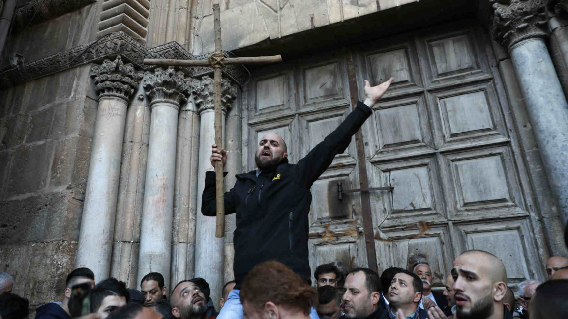 Palestinian man protests outside Church of the Holy Sepulchre