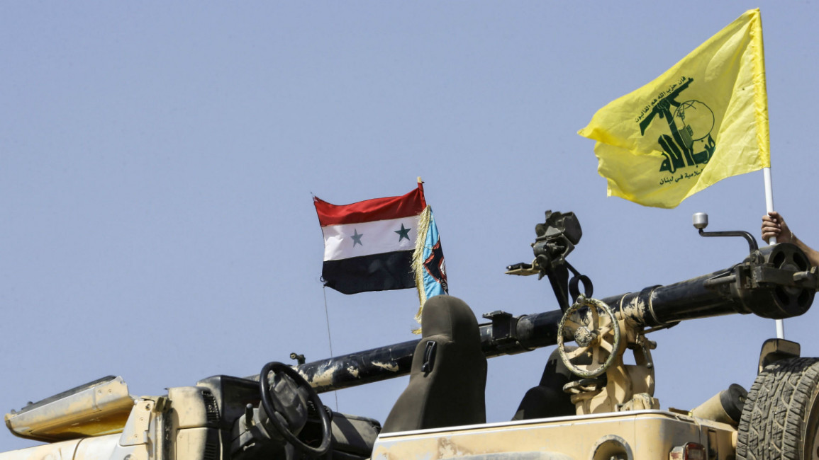 Hizballah Syria flags AFP