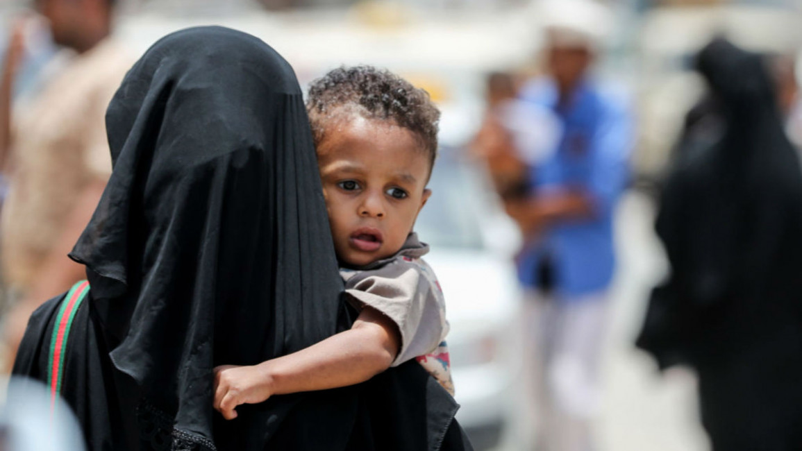 Yemeni woman and child - AFP